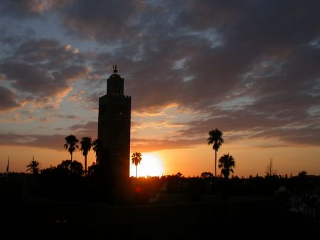 Solnedgang fra tagterrassen mod Koutoubia moskeen